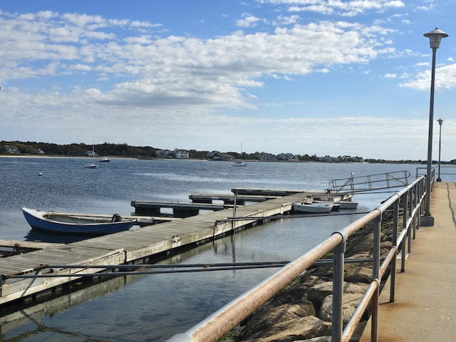 view of dock with a water view