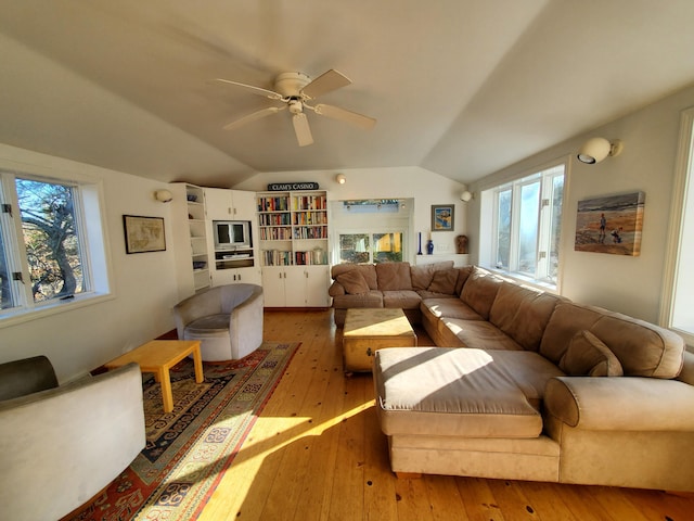 20 Spooner Rd, Eastham, MA 02642 - living room featuring light hardwood / wood-style floors, lofted ceiling, ceiling fan, and a healthy amount of sunlight