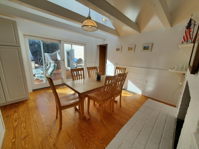 20 Spooner Rd, Eastham, MA 02642 - dining room with light hardwood / wood-style floors and lofted ceiling with beams