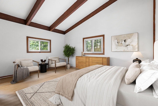 320 Coles Neck Rd, Wellfleet, MA 02667 - bedroom with beam ceiling, light wood-type flooring, and high vaulted ceiling