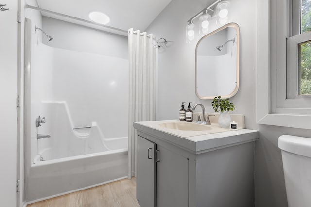 320 Coles Neck Rd, Wellfleet, MA 02667 - bathroom with bathtub / shower combination, vanity, and wood finished floors