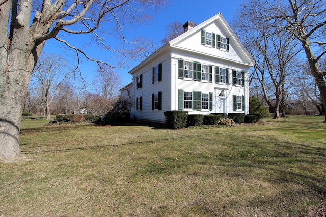 view of front of house with a front yard