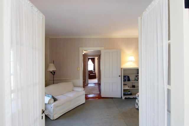 living room with ornamental molding