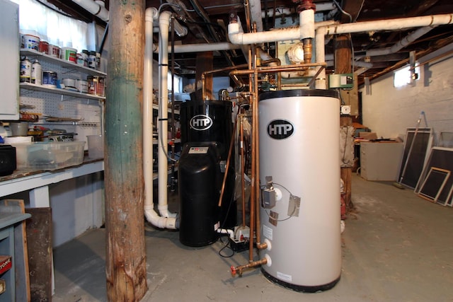 utility room featuring gas water heater