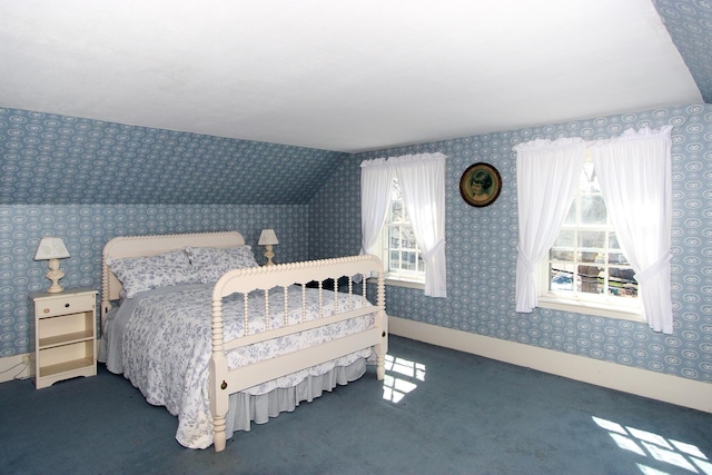 bedroom with dark carpet