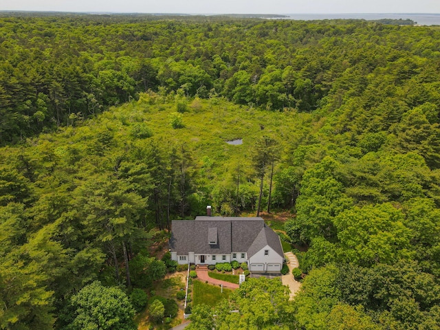 4 Canterbury Ln, Bourne, MA 02532 - view of subject property featuring a heavily wooded area