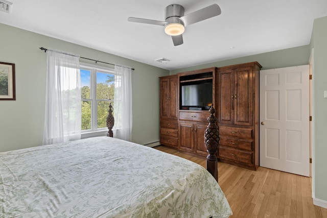 4 Canterbury Ln, Bourne, MA 02532 - bedroom with light wood-type flooring, baseboard heating, baseboards, and ceiling fan