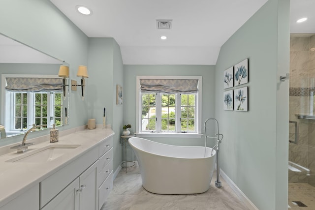 4 Canterbury Ln, Bourne, MA 02532 - bathroom featuring vanity, a soaking tub, a shower stall, marble finish floors, and baseboards