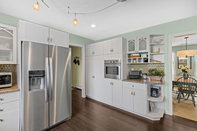 4 Canterbury Ln, Bourne, MA 02532 - kitchen with stainless steel appliances, open shelves, dark wood-style floors, decorative backsplash, and light stone countertops