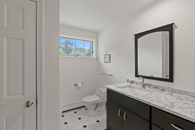 4 Canterbury Ln, Bourne, MA 02532 - bathroom with baseboard heating, vanity, toilet, baseboards, and tile patterned flooring