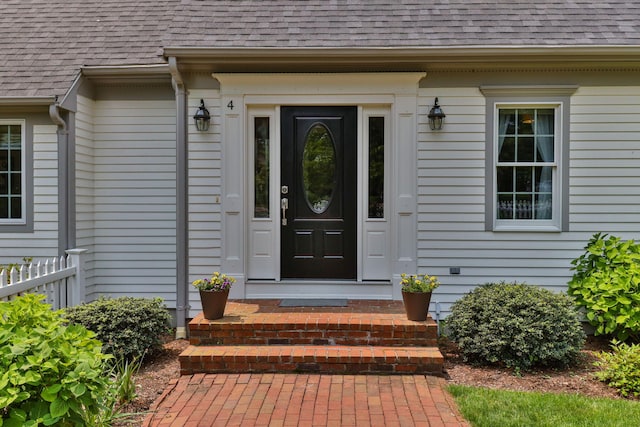 4 Canterbury Ln, Bourne, MA 02532 - entrance to property with a shingled roof