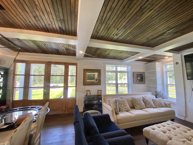 160 Ashumet Rd, East Falmouth, MA 02536 - living area with beam ceiling, dark wood finished floors, plenty of natural light, and french doors