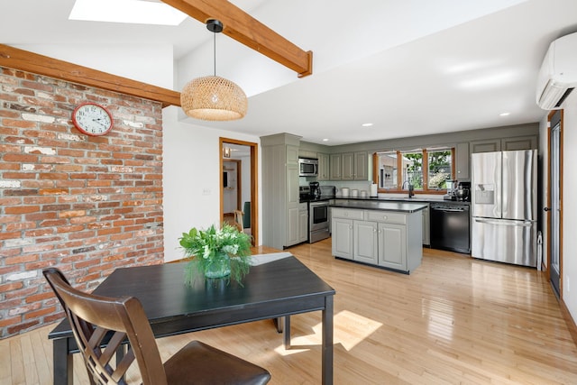 6 Paddock Dr, Harwich, MA 02645 - dining room featuring a wall mounted air conditioner, light wood-type flooring, beam ceiling, a skylight, and brick wall