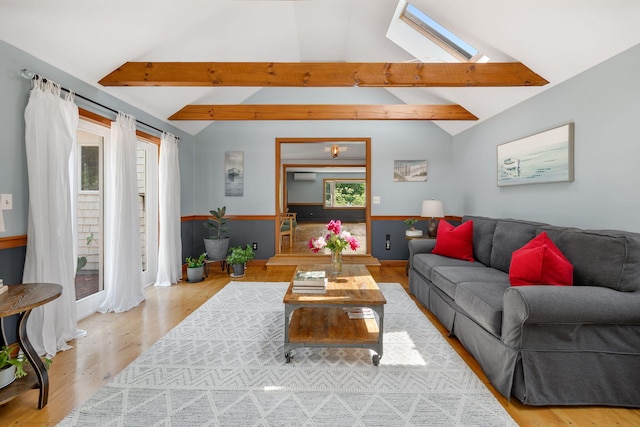 6 Paddock Dr, Harwich, MA 02645 - living room featuring a skylight and wood finished floors