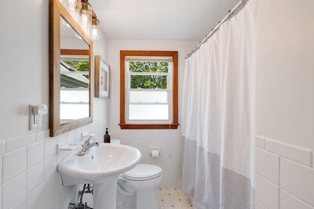 6 Paddock Dr, Harwich, MA 02645 - full bathroom featuring tile walls, wainscoting, and a shower with curtain
