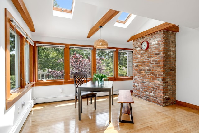 6 Paddock Dr, Harwich, MA 02645 - dining room featuring a skylight, healthy amount of natural light, and light wood-style flooring