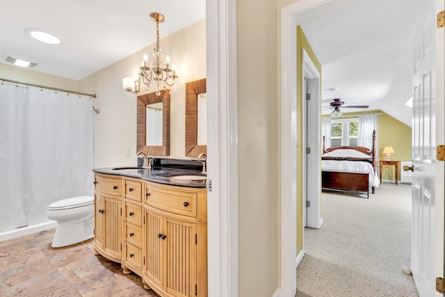17 Greenway Cir, Sandwich, MA 02563 - ensuite bathroom with a ceiling fan, toilet, double vanity, lofted ceiling, and curtained shower