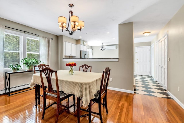 17 Greenway Cir, Sandwich, MA 02563 - dining room featuring a chandelier, baseboards, light wood finished floors, a wall unit AC, and recessed lighting