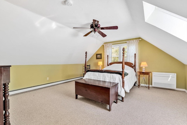 17 Greenway Cir, Sandwich, MA 02563 - carpeted bedroom featuring a baseboard radiator, lofted ceiling, a skylight, a ceiling fan, and baseboards