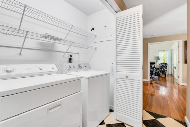 17 Greenway Cir, Sandwich, MA 02563 - laundry room featuring washing machine and dryer, baseboards, and light wood-style floors