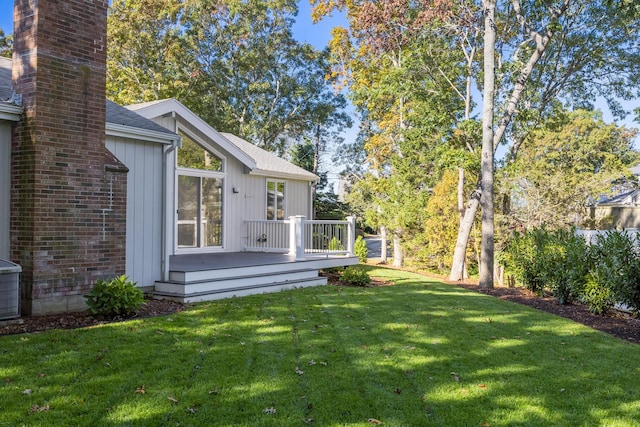 131 Portside Cir E, Falmouth, MA 02536 - view of grassy yard with a deck