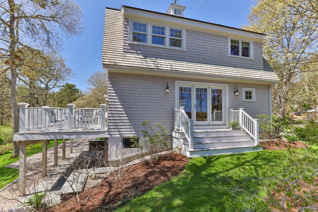 116 Happy Valley Rd, Chatham, MA 02633 - back of house with a deck and a lawn