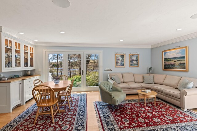 116 Happy Valley Rd, Chatham, MA 02633 - living room with crown molding, light wood-style flooring, recessed lighting, and bar area