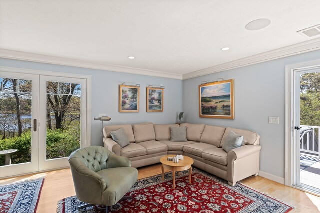 116 Happy Valley Rd, Chatham, MA 02633 - living room with crown molding, light wood-type flooring, recessed lighting, and baseboards