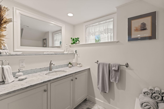 116 Happy Valley Rd, Chatham, MA 02633 - bathroom with baseboards, marble look tiles, vanity, and recessed lighting