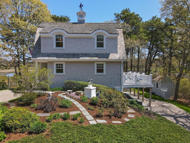 116 Happy Valley Rd, Chatham, MA 02633 - view of side of property with a wooden deck, an outdoor structure, and a shed