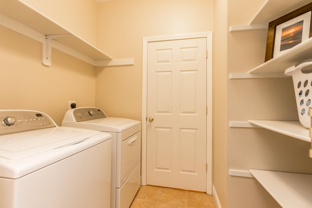 20 Twin Oaks Dr, Mashpee, MA 02649 - laundry area featuring separate washer and dryer and light tile patterned floors