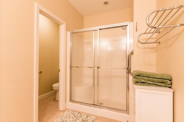 20 Twin Oaks Dr, Mashpee, MA 02649 - bathroom featuring a stall shower, tile patterned floors, toilet, and baseboards