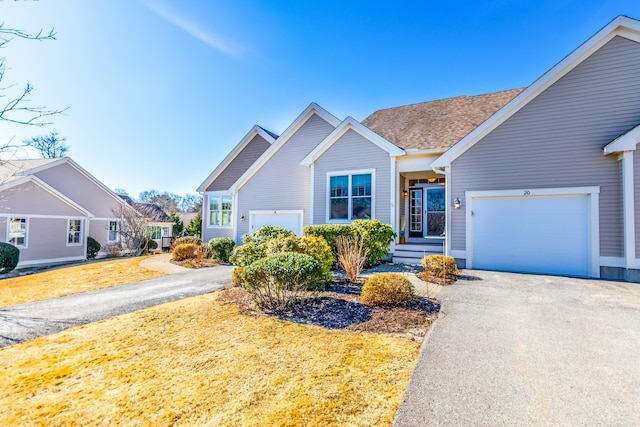 20 Twin Oaks Dr, Mashpee, MA 02649 - view of front of home featuring asphalt driveway and a garage