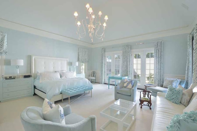 bedroom featuring french doors, crown molding, a chandelier, and light carpet