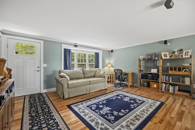 215 Head Of The Bay Rd, Buzzards Bay, MA 02532 - living area featuring plenty of natural light, light wood finished floors, crown molding, and baseboards