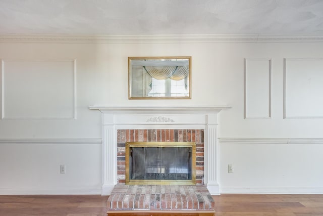 33 Highview Dr, Sandwich, MA 02563 - interior details featuring baseboards, crown molding, wood finished floors, and a fireplace