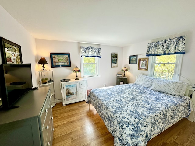 bedroom featuring light hardwood / wood-style floors