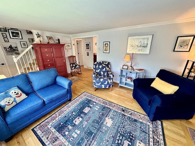 living room with crown molding and hardwood / wood-style flooring