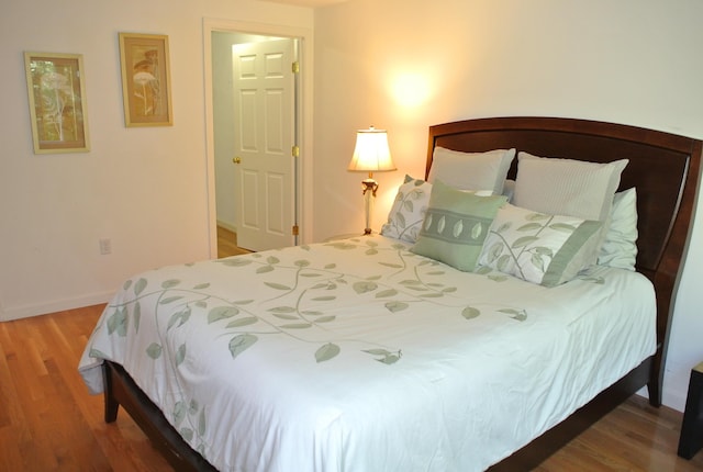 bedroom featuring hardwood / wood-style floors