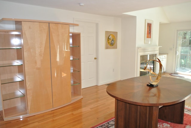 dining room with light wood-type flooring