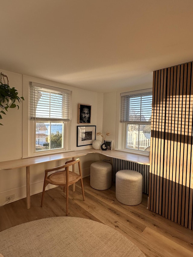 476 Commercial St Unit 4, Provincetown, MA 02657 - sitting room with wood finished floors and an office area