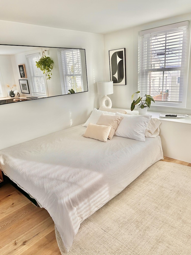476 Commercial St Unit 4, Provincetown, MA 02657 - bedroom with wood finished floors