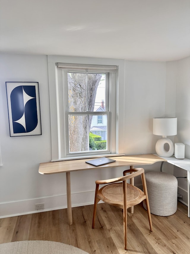 476 Commercial St Unit 4, Provincetown, MA 02657 - dining area with wood finished floors and baseboards