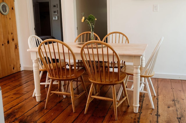 115 Rte 28, West Harwich, MA 02671 - dining space with baseboards and hardwood / wood-style floors