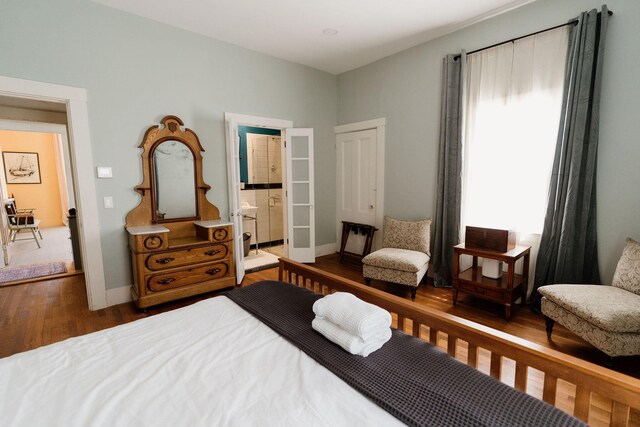 115 Rte 28, West Harwich, MA 02671 - bedroom with baseboards, multiple windows, and wood finished floors