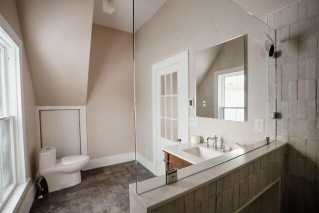 115 Rte 28, West Harwich, MA 02671 - bathroom with lofted ceiling, toilet, and a walk in shower
