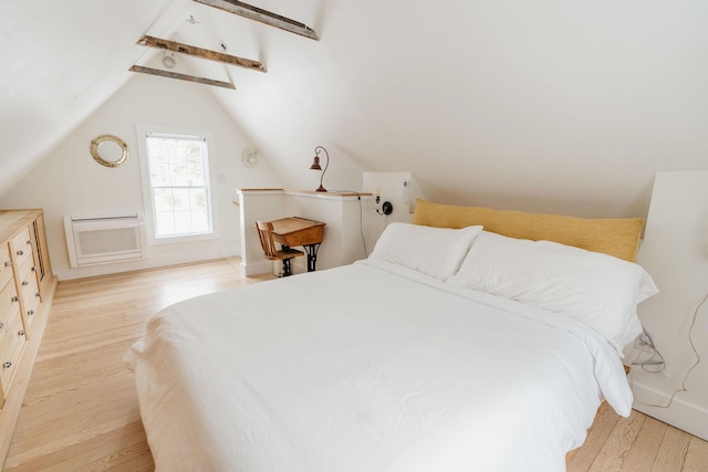 115 Rte 28, West Harwich, MA 02671 - bedroom featuring light wood-style flooring, a wall mounted AC, and lofted ceiling