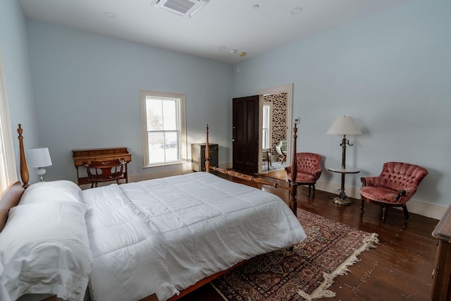 115 Rte 28, West Harwich, MA 02671 - bedroom with dark wood finished floors, baseboards, and visible vents