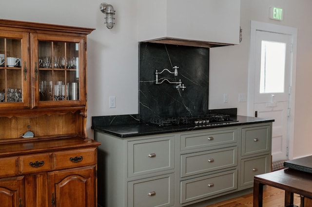 115 Rte 28, West Harwich, MA 02671 - interior space featuring decorative backsplash and black gas stovetop