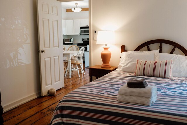 115 Rte 28, West Harwich, MA 02671 - bedroom with a toaster, wood finished floors, and baseboards